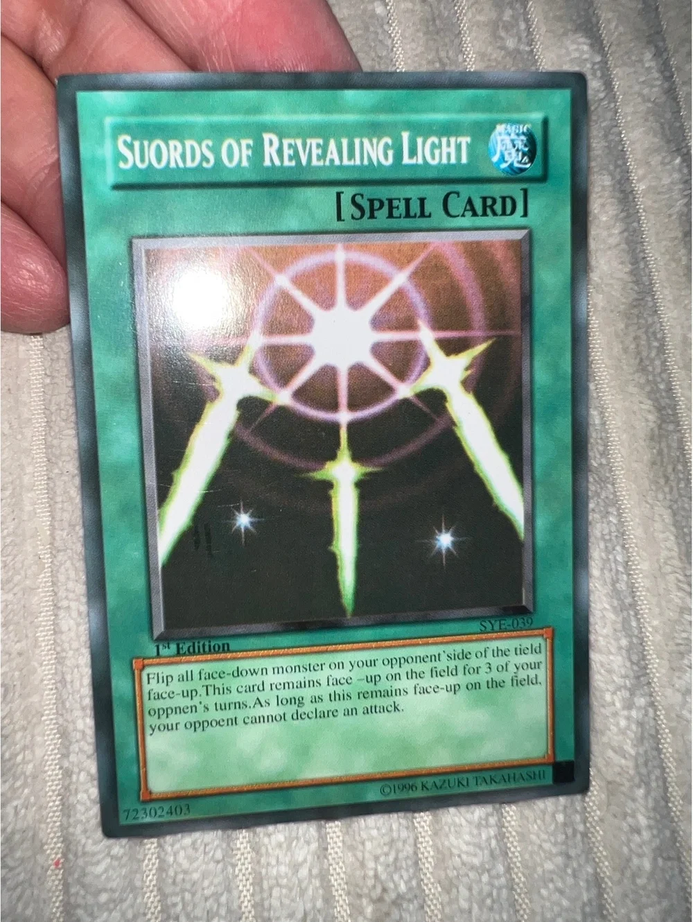 Yu-Gi-Oh! 1st Edition Super Rare Suords  swords of Revealing Light misspelling